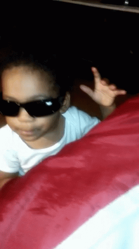 Baby Looks Like Stevie Wonder GIF