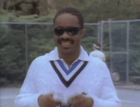 Stevie Wonder Laughing With Camera GIF