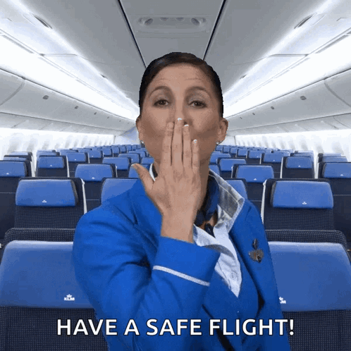 Stewardess Covering Mouth With Safe Flight
