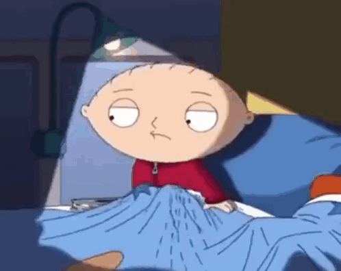 Stewie From Family Guy Is Laying In Bed GIF