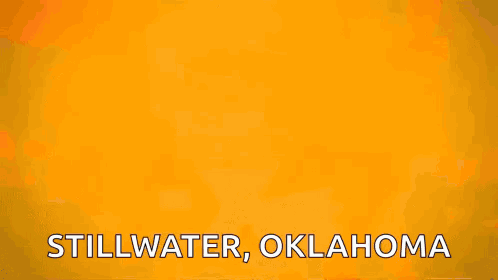 Stillwater Oklahoma Sign With Fire Background