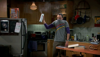 Stinky Sheldon Cooper Spraying Perfume GIF