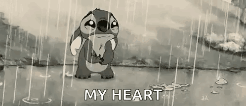 Stitch From Disney 'S Lilo And Stitch Is Crying In The Rain In A Black And White Cartoon . GIF