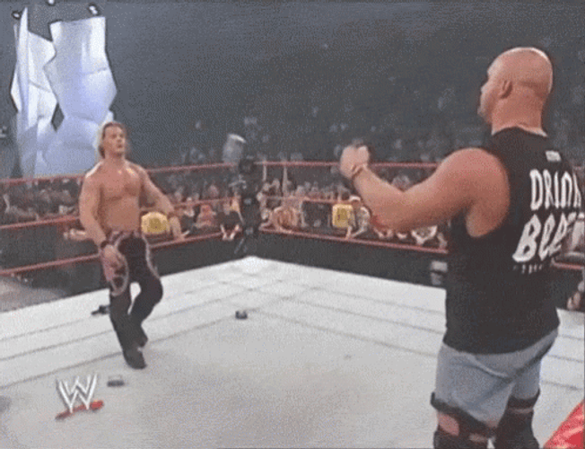 Stone Cold Beer Steve Austin Facing Undertaker GIF