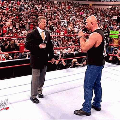 Stone Cold Stunner Face Off Vince McMahon GIF