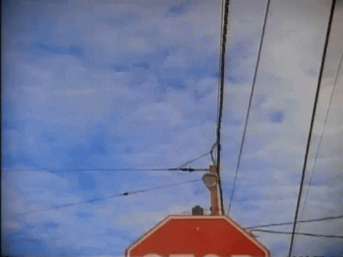Stop Sign Hanging From Pole