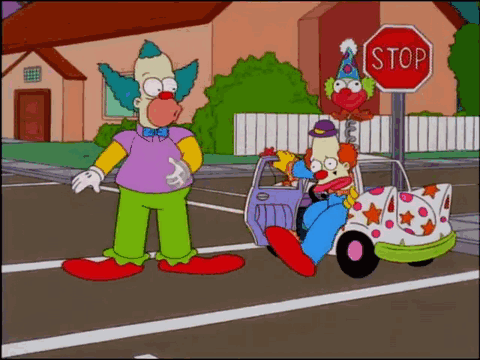 Stop Sign With Clown in Car