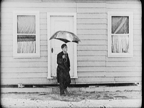 Storming Silent Film Umbrella GIF