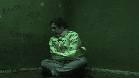 Straight Jacket Man Talking To Himself GIF