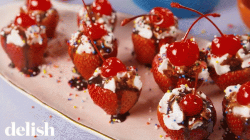 Strawberry Cupcakes With Cherries and Whipped Cream