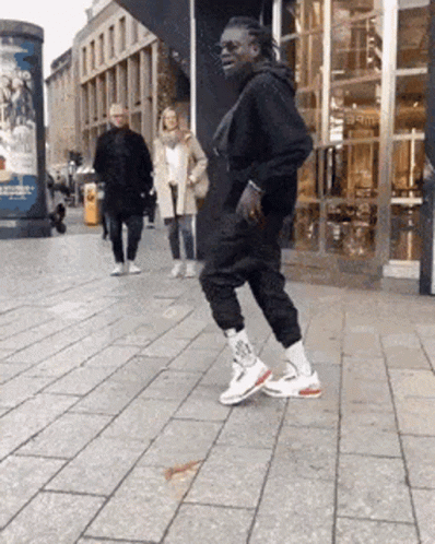 Street Dancer Doing Smooth Moonwalk GIF