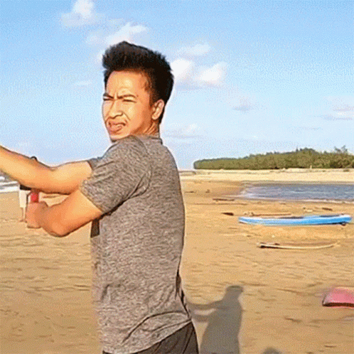 Stretching Arms Beachside GIF