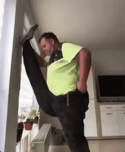 Stretching Leg Pants GIF