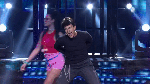 Strip Tease Robbie Williams GIF
