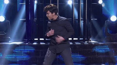 Strip Tease Robbie Your Face Performance GIF