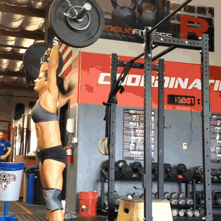 Strong Girl Weightlifting Squats GIF