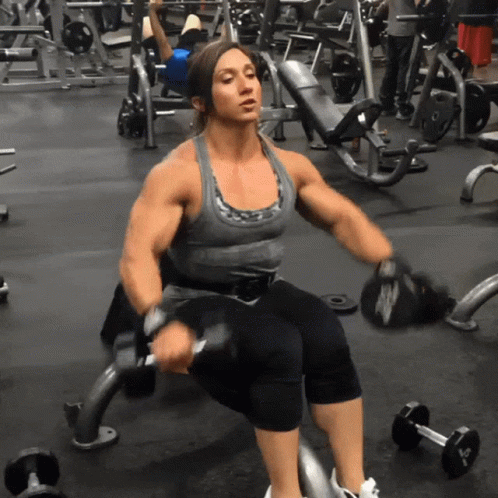 Strong Woman Lateral Raises GIF