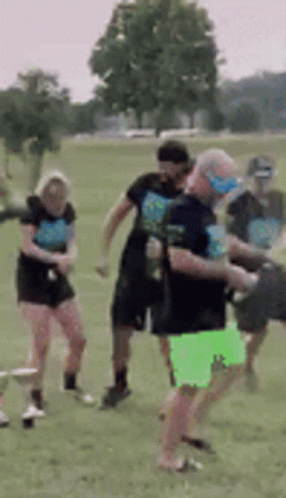 Struggling Woman On A Kickball Field GIF