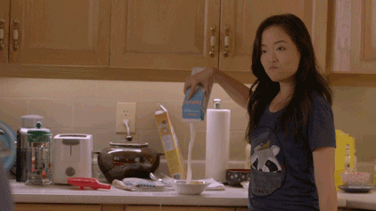 Stubborn Girl Spilled Some Milk On Countertop GIF