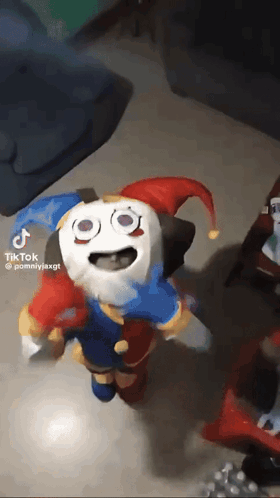 Stuffed Animal Dressed as Jester Standing