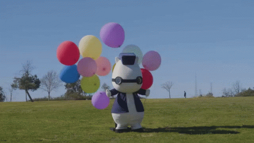 Stuffed Animal Holding Balloons