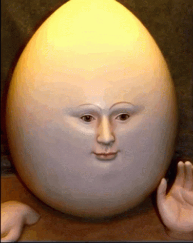 Stuffed Animal Holding Basket of Easter Eggs Is That a Golden Egg