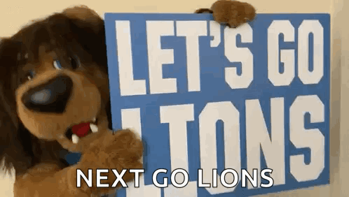 Stuffed Animal Holding Sign Let's Go Tons Next Go Lions GIF