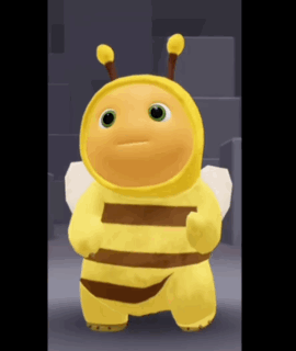 Stuffed Animal in Bee Costume Standing in Dark Room