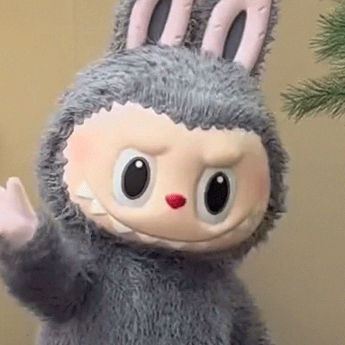 Stuffed Animal In Bunny Costume Waving GIF