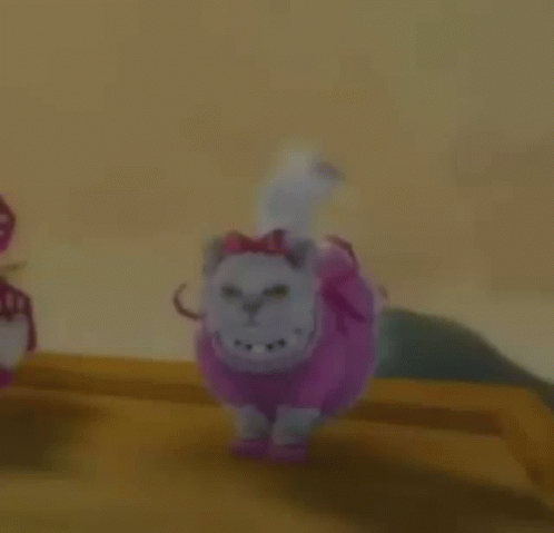 Stuffed Animal in Pink Dress and Hat
