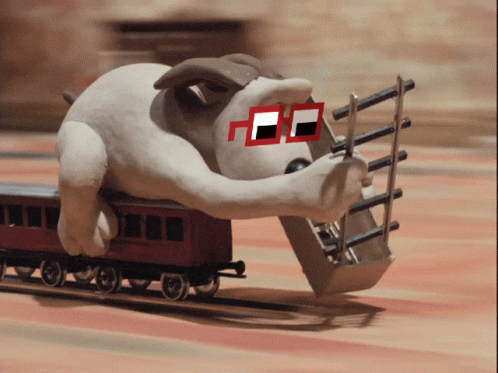 Stuffed Animal In Red Glasses Pushing Toy Train GIF