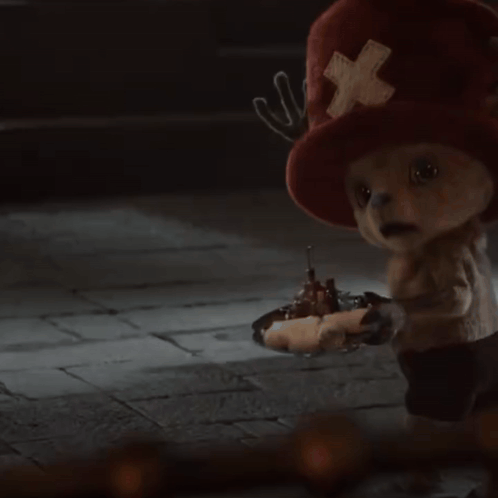 Stuffed Animal in Red Hat and Shorts