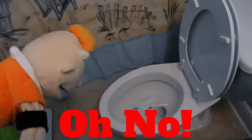 Stuffed Animal Looking Into Toilet Oh No