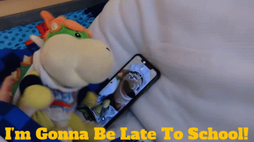 Stuffed Animal Next to Phone Saying I'm Gonna Be Late to School