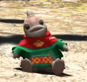 Stuffed Animal Sitting In Sweater GIF