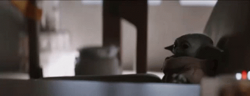 Stuffed Animal Sitting On Table GIF