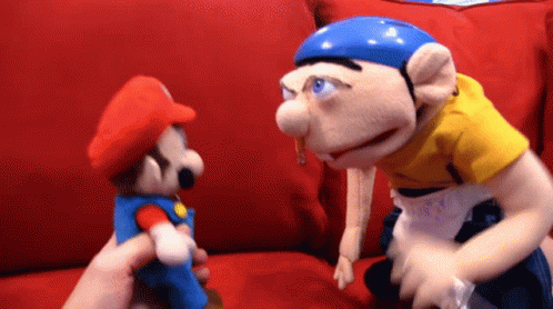 Stuffed Animal With Glasses and One With Hat