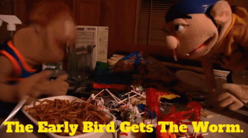 Stuffed Animals at Table With Noodles