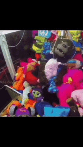 Stuffed Animals Including Gorilla With Peace Sign
