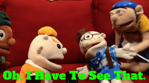Stuffed Animals on Red Couch Saying Oh I Have to See That