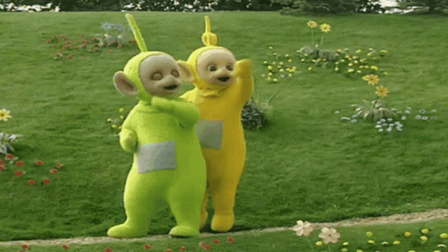 Stuffed Animals Standing In A Field GIF