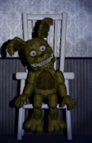 Stuffed Bunny Sitting in Chair