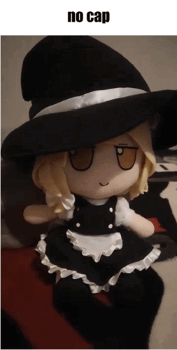 Stuffed Doll in Witch Hat and Maid Dress