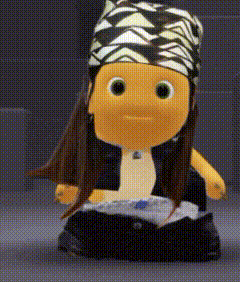 Stuffed Doll With Bandana and Black Vest