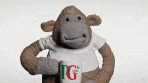 Stuffed Gorilla Holding Cup Of PG Tea GIF