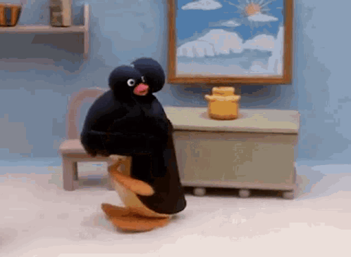 Stuffed Penguin Dancing in Room