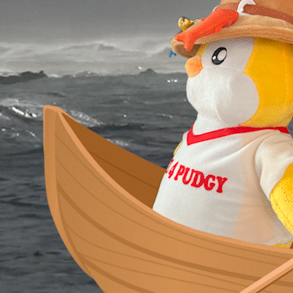 Stuffed Penguin In Puddy Shirt On Boat In Ocean GIF