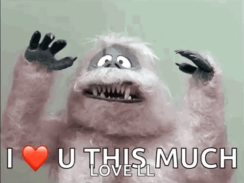 Stuffed Reindeer With Red Nose And Bells GIF