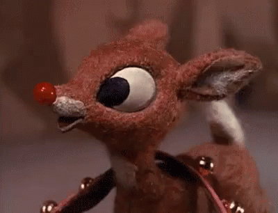 Stuffed Reindeer With Red Nose And Bells GIF