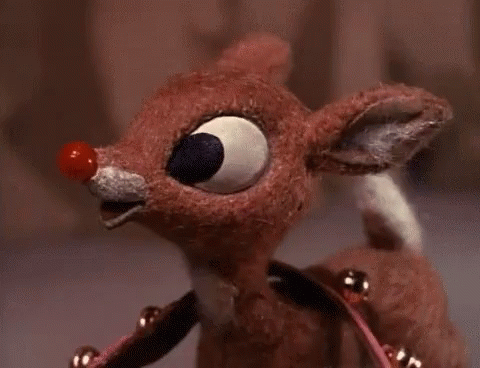 Stuffed Reindeer With Red Nose And Bells GIF